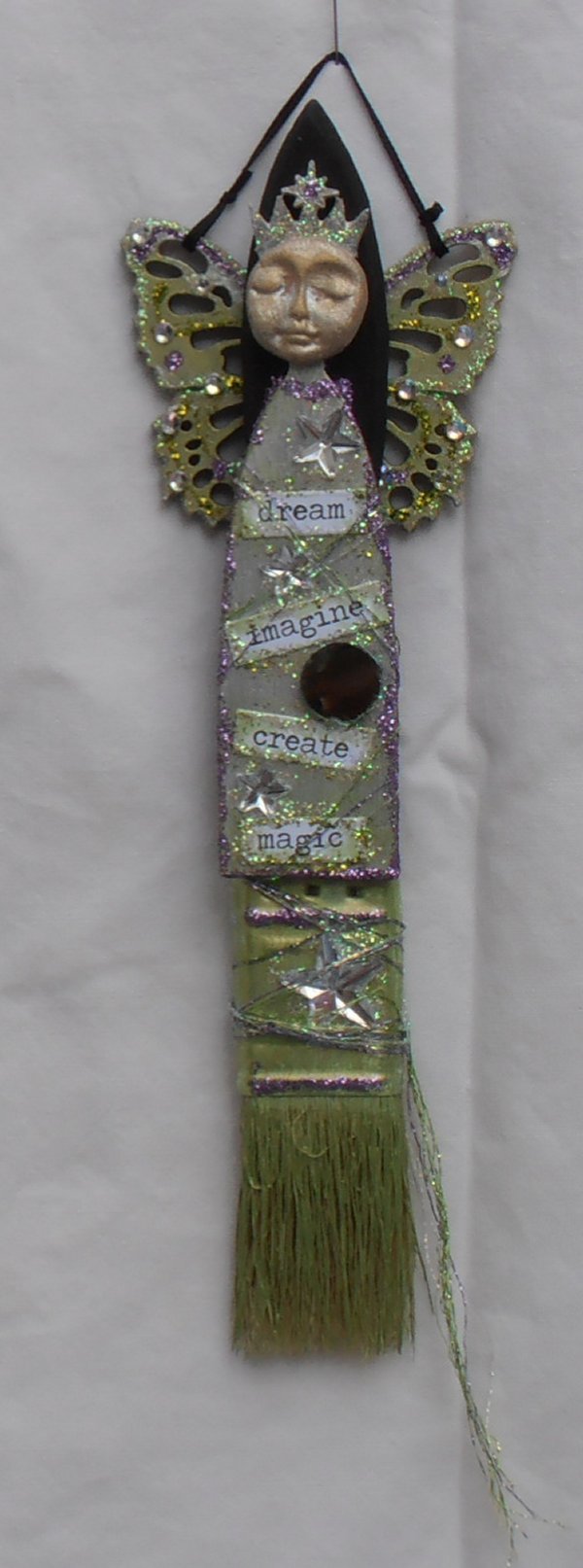 Luna paintbrush doll